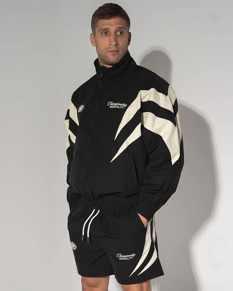 Jaqueta Champion Mentality Track (Preta / Branca) 