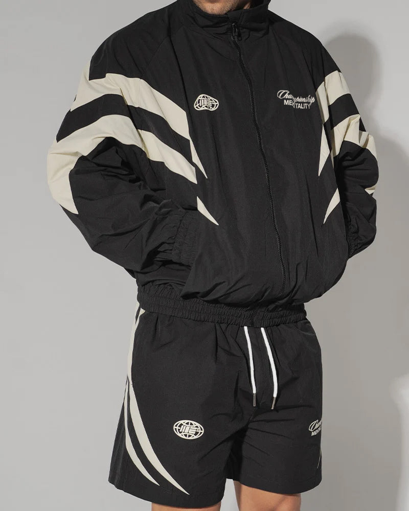 Jaqueta Champion Mentality Track (Preta / Branca) 