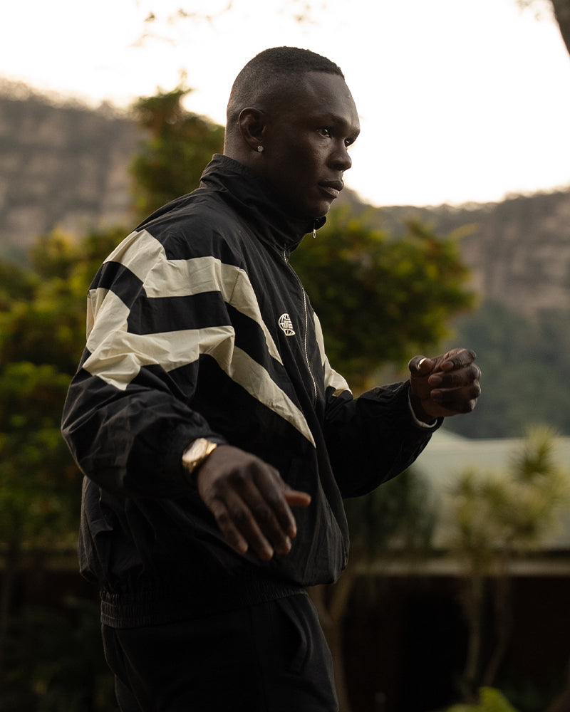 Jaqueta Champion Mentality Track (Preta / Branca) 