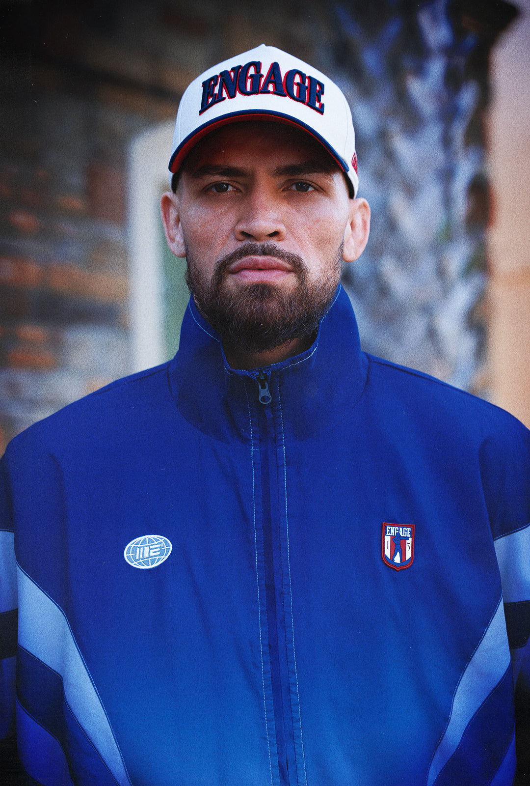 Jaqueta Champion Mentality Track (Preta / Branca) 